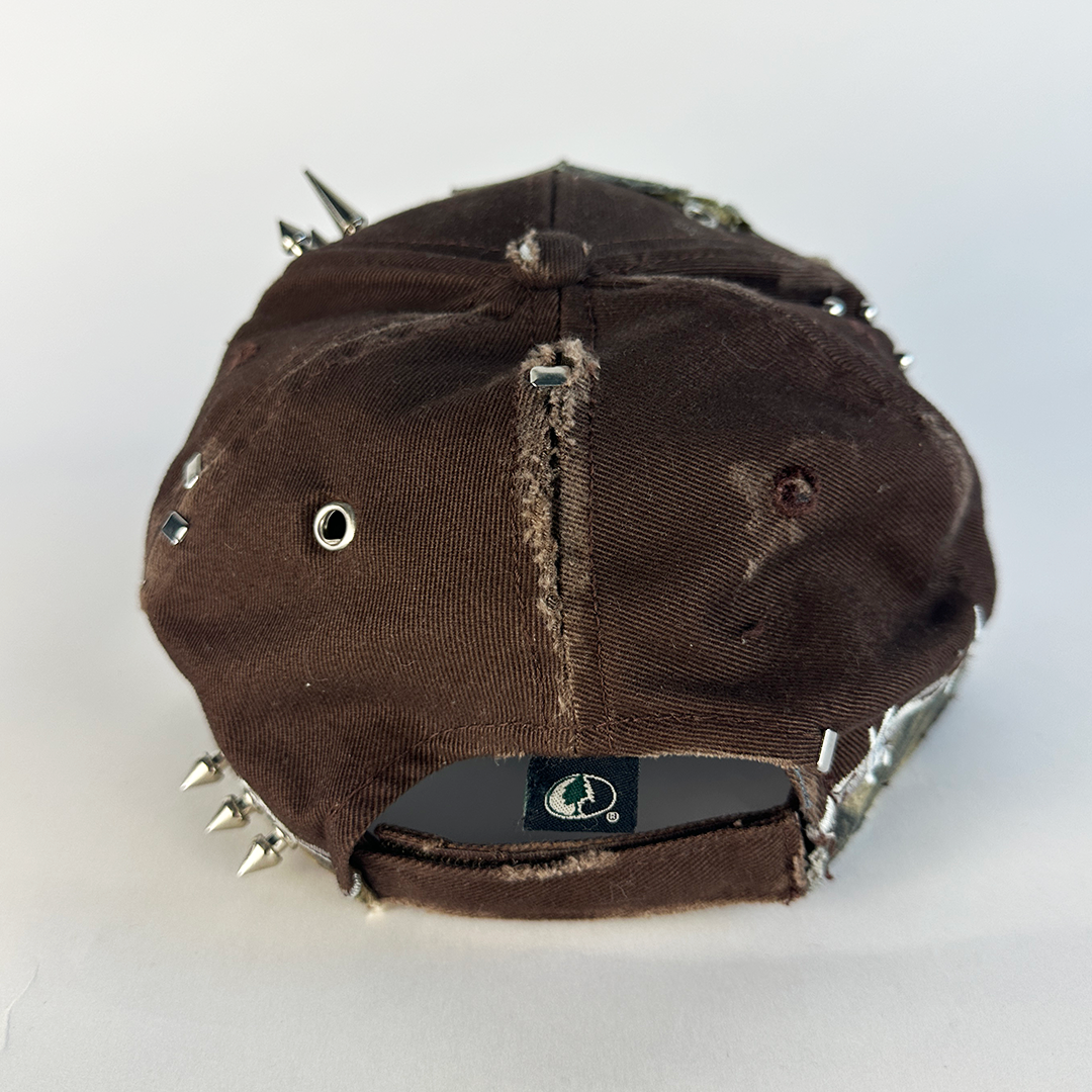 brown studded camo hat